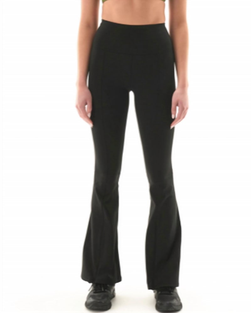 Front of a model wearing a size L Full Force Legging in Black in Black by P.E. NATION. | dia_product_style_image_id:346056
